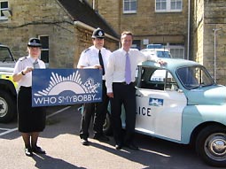 MP for Witney, David Cameron, with ‘Bobby’, PC Reg Nicolson and Liz Mitchell  at the launch which included a stop at  Chipping Norton police station